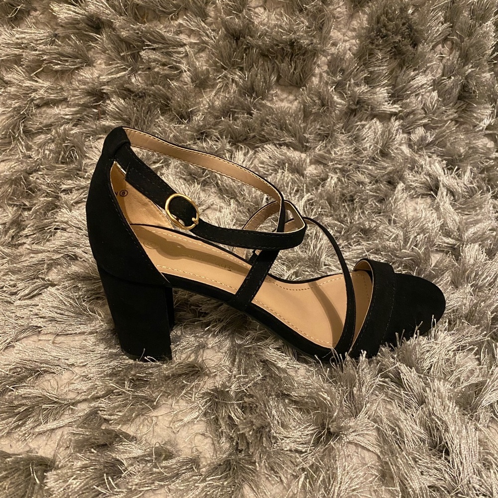 Strappy black heels